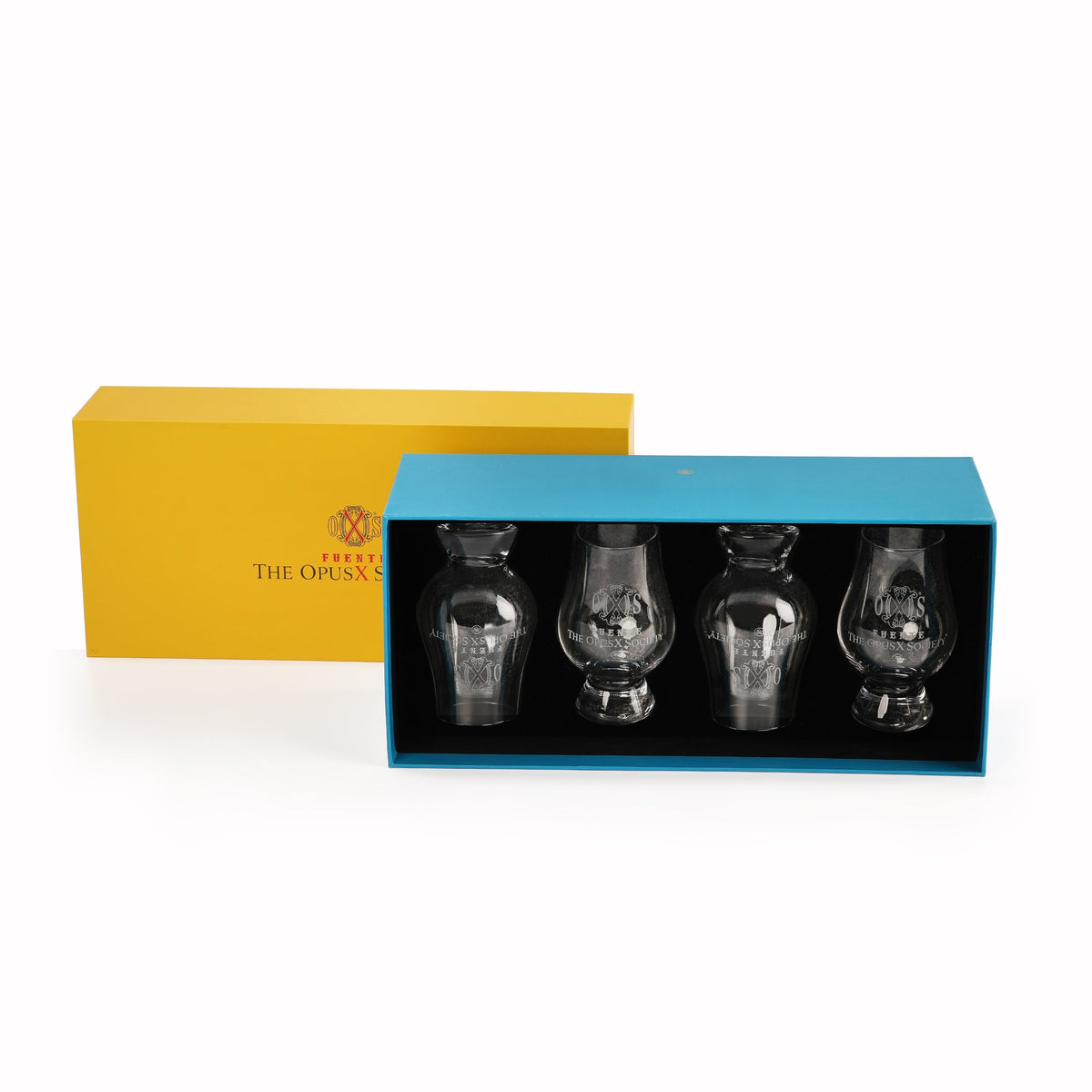 Set of four OpusX Society Glencairn glasses in the open yellow and blue gift box