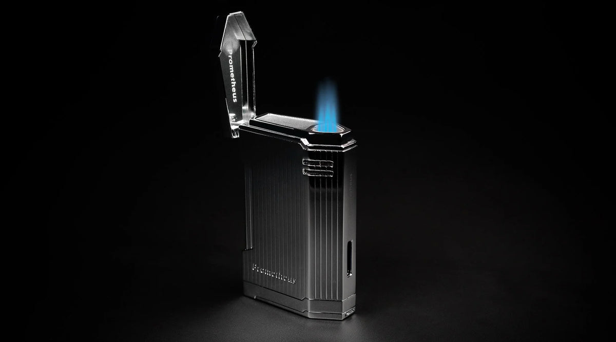 Prometheus Magma T22 chrome vertical lines table lighter, lid open with triple torch flame lit