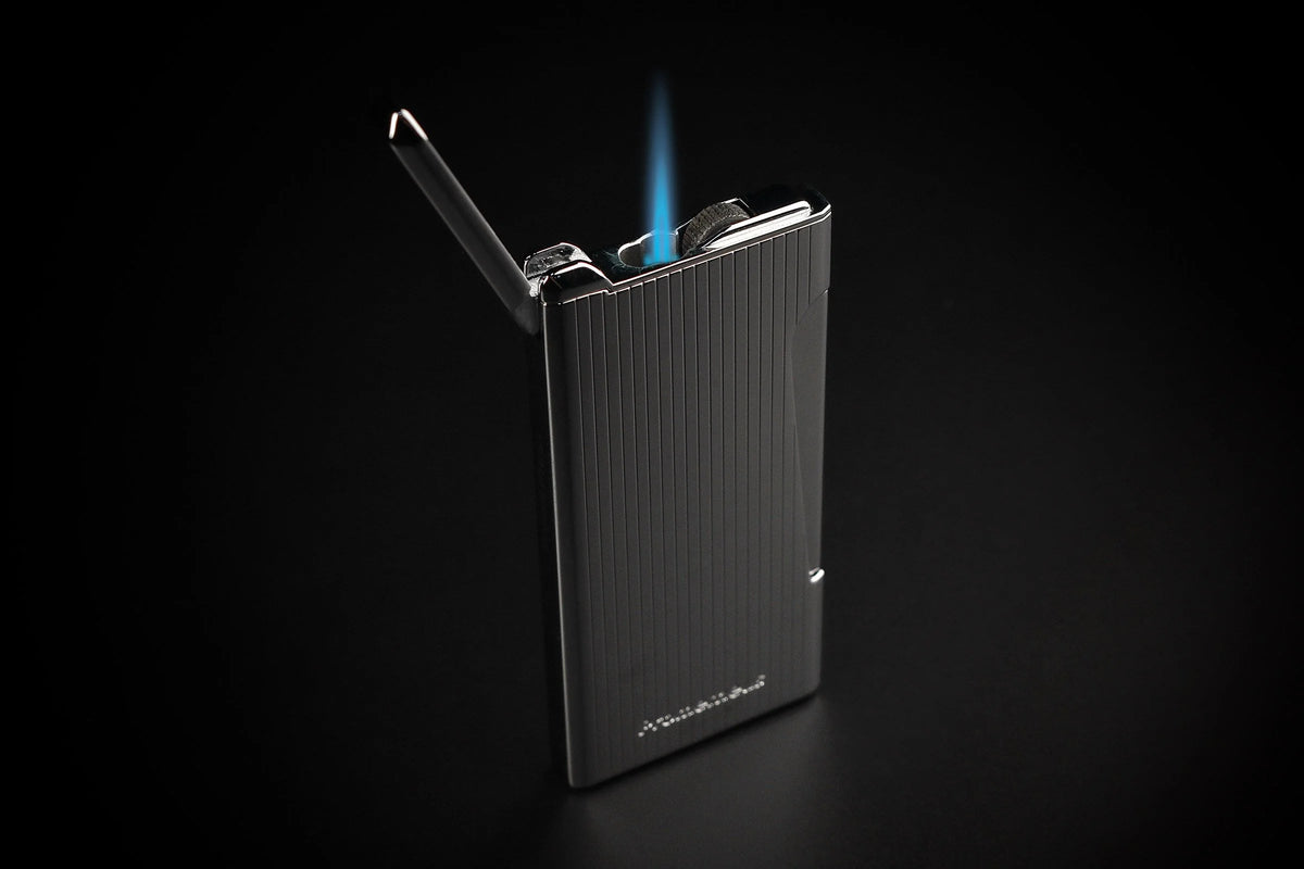 Prometheus Retro chrome vertical lines lighter, lid open with single torch flame lit