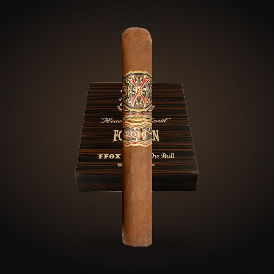 Arturo Fuente Opus X Tauros the Bull Natural, closed box with a cigar in front — Sun of a Gun Cigars & Spirits, Yuma Arizona