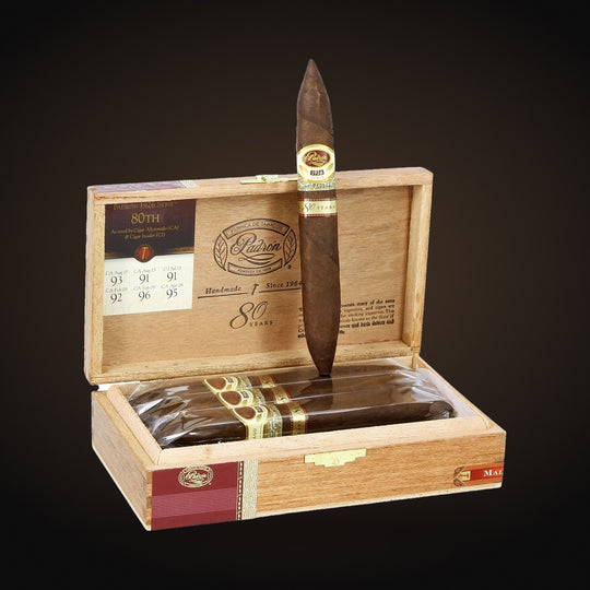 Padrón 1926 Series 80th Anniversary Perfecto, open box with a cigar on the lid — Sun of a Gun Cigars & Spirits, Yuma Arizona