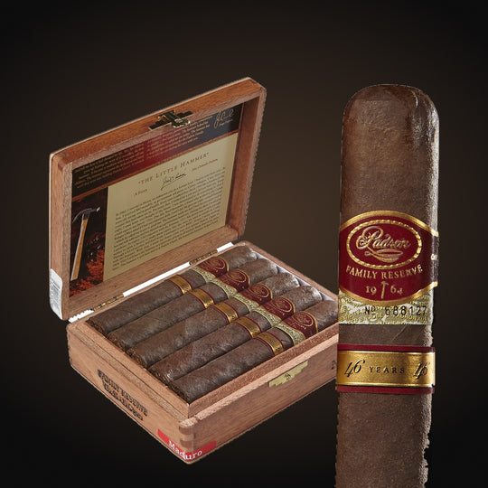 Padrón Family Reserve No. 46, open box with a cigar beside it — Sun of a Gun Cigars & Spirits, Yuma Arizona