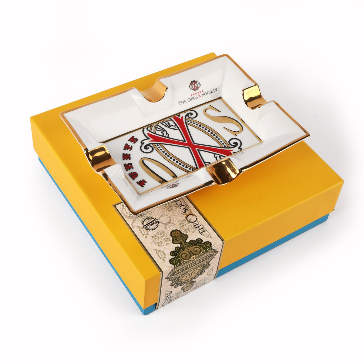 OpusX Society El Blanco ashtray on its yellow and blue OpusX Society gift box
