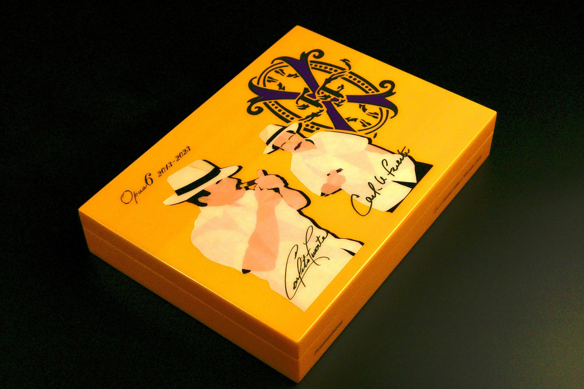 Fuente Opus6 travel humidor open with six rare Fuente Aged Selection cigars