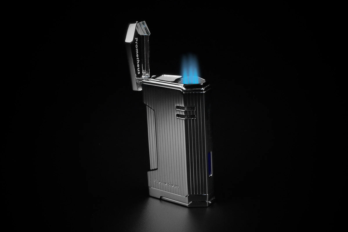 Prometheus Magma X vertical lines lighter, lid open with triple torch flame lit