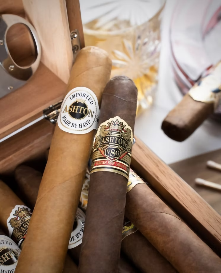 Ashton cigars beside a crystal glass at Sun of a Gun Cigars & Spirits, Yuma, Arizona