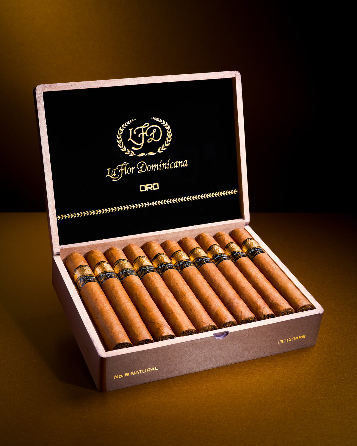 Open box of La Flor Dominicana Oro No. 8 cigars