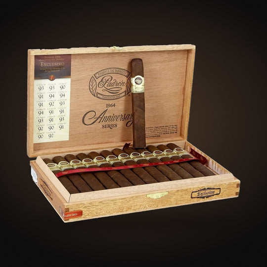 Padrón 1964 Anniversary Series Exclusivo, open box with a cigar on the lid — Sun of a Gun Cigars & Spirits, Yuma Arizona