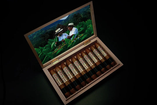 Arturo Fuente Opus X Rare Black Diadema 60, open box of cigars with the tobacco-field photograph inside the lid